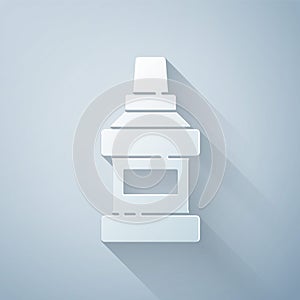 Paper cut Mouthwash plastic bottle icon isolated on grey background. Liquid for rinsing mouth. Oralcare equipment. Paper