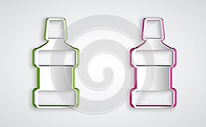 Paper cut Mouthwash plastic bottle icon isolated on grey background. Liquid for rinsing mouth. Oralcare equipment. Paper