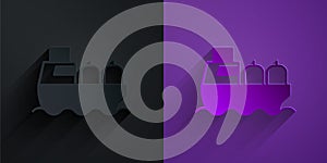 Paper cut Oil tanker ship icon isolated on black on purple background. Paper art style. Vector