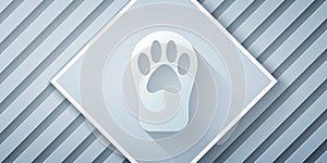 Paper cut Paw print icon isolated on grey background. Dog or cat paw print. Animal track. Paper art style. Vector