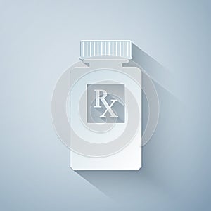 Paper cut Pill bottle with Rx sign and pills icon isolated on grey background. Pharmacy design. Rx as a prescription