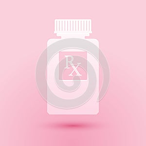 Paper cut Pill bottle with Rx sign and pills icon isolated on pink background. Pharmacy design. Rx as a prescription symbol on
