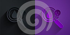 Paper cut Poisonous research magnifying glass icon isolated on black on purple background. Paper art style. Vector photo