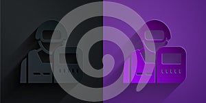 Paper cut Police officer icon isolated on black on purple background. Paper art style. Vector