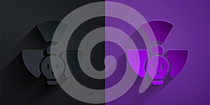 Paper cut Radioactive icon isolated on black on purple background. Radioactive toxic symbol. Radiation hazard sign