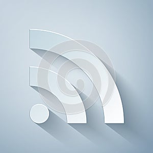 Paper cut RSS icon isolated on grey background. Radio signal. RSS feed symbol. Paper art style