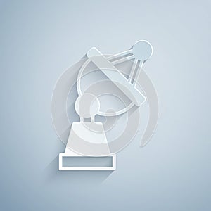 Paper cut Satellite dish icon isolated on grey background. Radio antenna, astronomy and space research. Paper art style