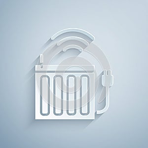 Paper cut Smart heating radiator system icon isolated on grey background. Internet of things concept with wireless