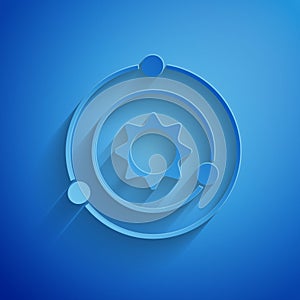 Paper cut Solar system icon isolated on blue background. The planets revolve around the star. Paper art style. Vector