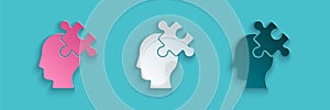 Paper cut Solution to the problem in psychology icon isolated on blue background. Puzzle. Therapy for mental health