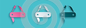 Paper cut Swiss army knife icon isolated on blue background. Multi-tool, multipurpose penknife. Multifunctional tool