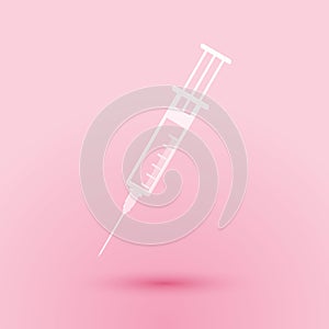 Paper cut Syringe icon isolated on pink background. Syringe sign for vaccine, vaccination, injection, flu shot. Medical