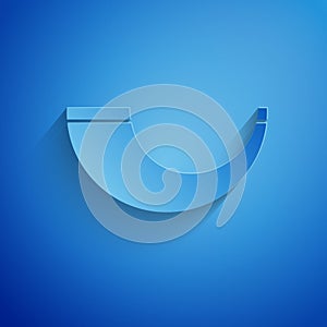 Paper cut Traditional ram horn, shofar icon isolated on blue background. Rosh hashanah, jewish New Year holiday