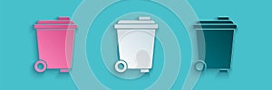 Paper cut Trash can icon isolated on blue background. Garbage bin sign. Recycle basket icon. Office trash icon. Paper
