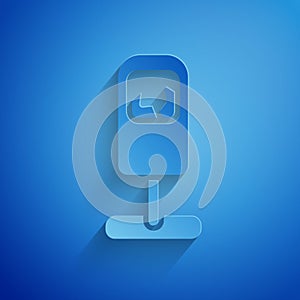 Paper cut Trash can icon isolated on blue background. Garbage bin sign. Recycle basket icon. Office trash icon. Paper