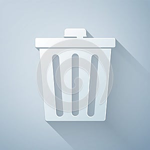 Paper cut Trash can icon isolated on grey background. Garbage bin sign. Recycle basket icon. Office trash icon. Paper