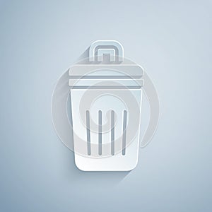 Paper cut Trash can icon isolated on grey background. Garbage bin sign. Recycle basket icon. Office trash icon. Paper