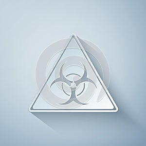 Paper cut Triangle sign with Biohazard symbol icon isolated on grey background. Paper art style