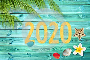 Paper cut 2020, tropical vacation background with palm tree and seashells new year card