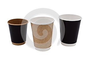 Paper, disposable glasses for drinks on a white background