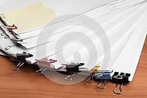 Paper documents with color metal clips