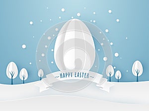 Paper Easter egg, and trees on blue background.