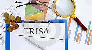 Paper with Employee Retirement Income Security Act ERISA on a table