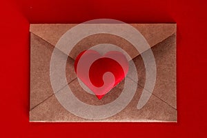 Paper envelope with red heart