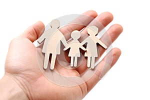 Paper family in hand on white background, closeup. Life insurance concept