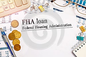 Paper with FHA loan - Federal Housing Administration on a table