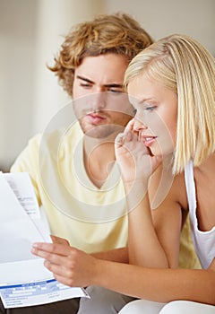 Paper, finance and couple with documents in a house for future planning, investment or asset management. Paperwork