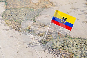 Ecuador flag pin on world map