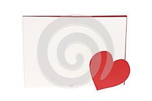 Paper heart bookmark on blank open book isolated on white