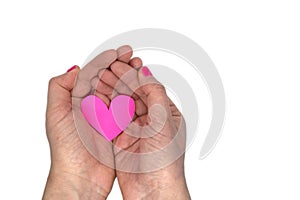 Paper heart in female hands