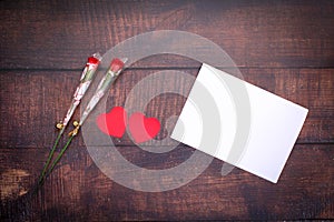 Paper heart with red roses