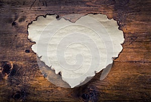 Paper hearts on a wooden board. Valentines day, Wedding day. Empty heart, free space for your love text