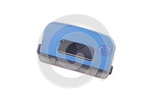 Paper hole puncher isolated over the white background.