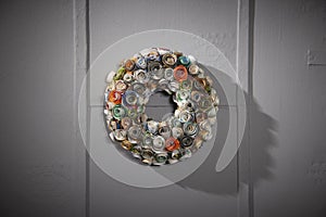 Paper holiday wreath on grey