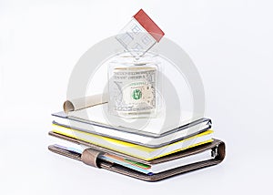 Paper home into glass saving on books stack