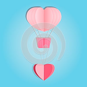 Paper hot air balloon with heart isolated on blue background.
