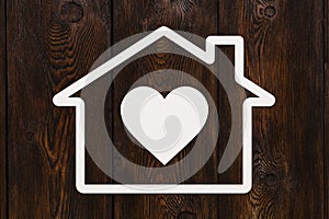 Paper house with heart inside. Housing concept. Abstract conceptual image