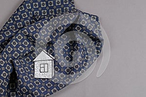 Paper House and scarf cachet on gray background. Drawing on whit photo