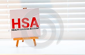 Paper with HSA on a table business and financial concept
