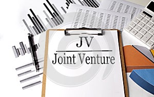 Paper with JV Joint Venture on a chart background, business concept