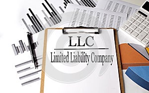 Paper LLC Limited Liability Company with on a chart background