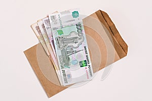 Paper money of the Russian Federation. A stack of banknotes for payments of pensions, wages, benefits and other social benefits