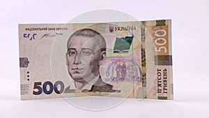Paper money. Ukrainian hryvnia in denominations 500 hryvnias isolated on white background. Portrait of Hryhoriy