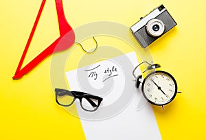 Paper My Style, hanger, alarm clock, camera and glasses