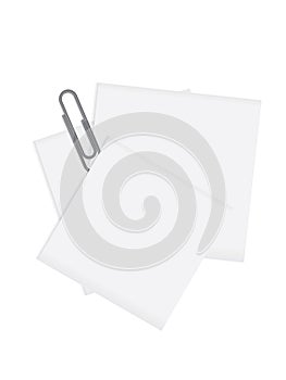 Paper note with a gray paperclip over a blank back