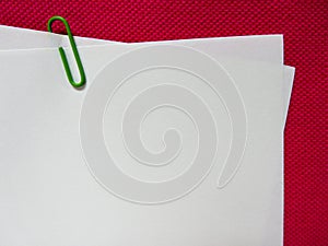 Paper note with green clip